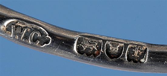 A pair of silver semi circular menu holders, by William Comyns, LENGTH; 3”/79mm Height; 1 ¾”/44mm